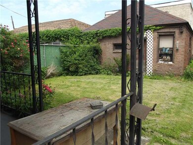 Exterior Back. Decent sized yard, back porch, and 