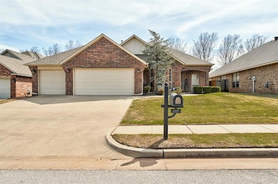 View of front of house featuring driveway, a front