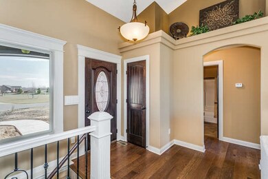 Beautiful leaded glass front door and lighted plan