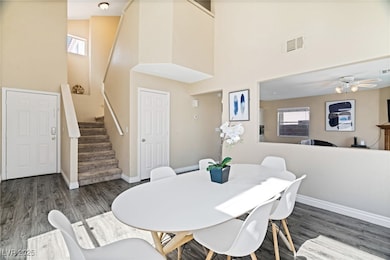 Dining room with baseboards, wood finished floors,