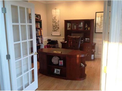 Den/Family/Great Room. French doors separate the f