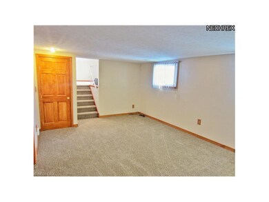 Neutral lower level family room!