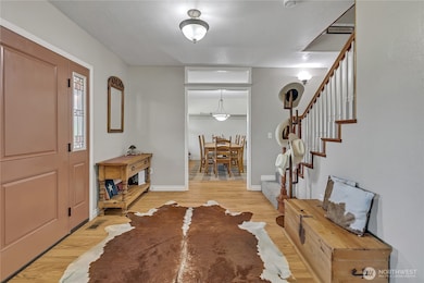 Large foyer leads to the dining area or large living room.