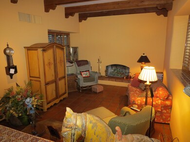 Quaint Living Room with beamed ceiling.