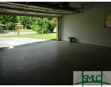 Parking Lot/Garage. LARGE GARAGE WITH REMOTE CONTR