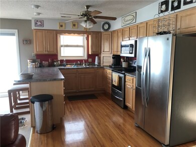 Updated Kitchen with Maple Cabinets, SS Appliances