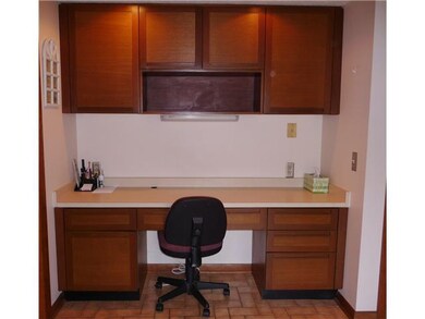 Kitchen. The kitchen also has a planning desk--per