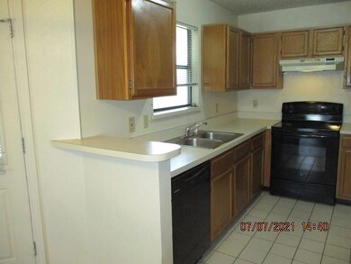 Functional kitchen with a dishwasher, garbage disp