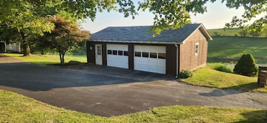 detached garage with additional work and storage space