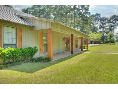 Photo. Home features a lovely porch with oversized