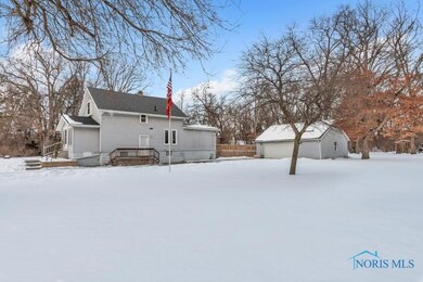 Amazing lot with an above ground pool surrounded b
