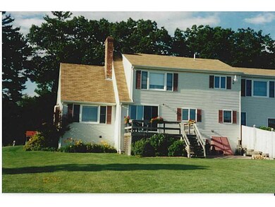Exterior back of home with Peonies &...