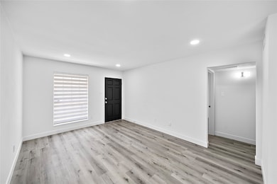The front door opens to a generously sized living