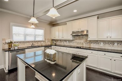 White Cabinets & Black Granite