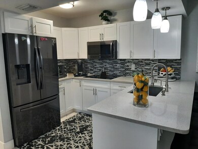 1790 Abbey Rd unit 103B, West Palm Beach, FL 33415 - photo 2