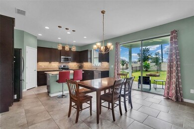 The dining room overlooks the living room and kitc