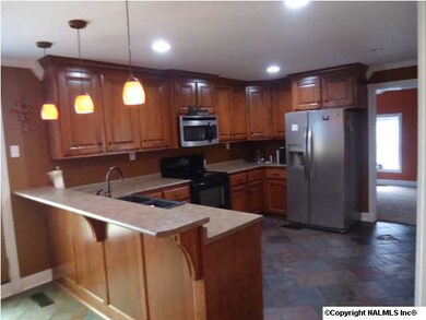 Kitchen with slate tile floors