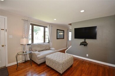 Living room opens up into dining room and stairs l