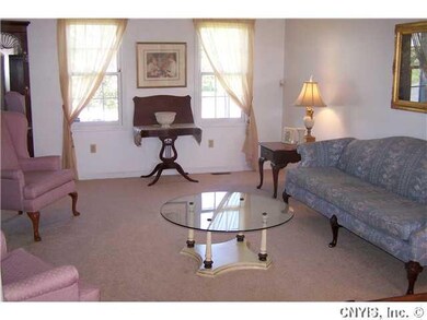 Living Room. Formal living room off two story foye