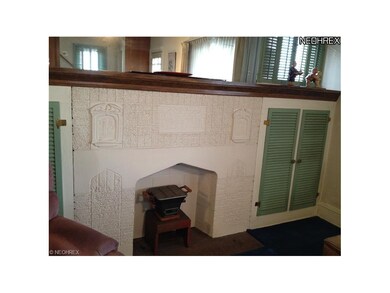 Brick faux fireplace creates a wonderful focal poi