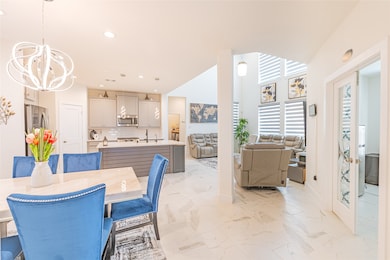 Open Concept Family, Dining, kitchen with Study to the right.