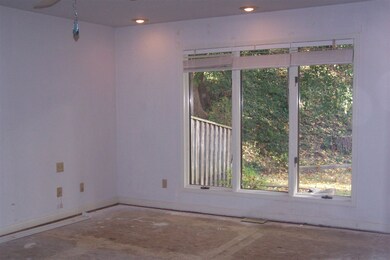 Master bedroom looking out to the back yard. Maste