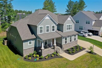 Craftsman style home with large fenced in backyard