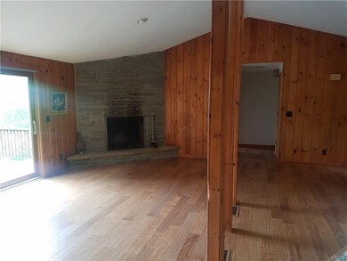 large living room with cathedral ceiling and large