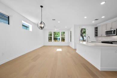 Kitchen featuring a sink, visible vents, stainles