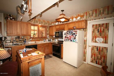 KITCHEN IS WIDE OPEN TO FAMILY ROOM