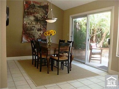 Plenty of room for large table and cabinets. Slide