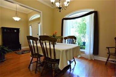 NOTE THE LARGE PICTURE GLASS WINDOW IN DINING ROOM