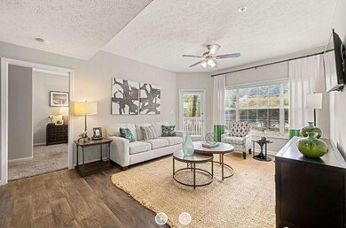 Living room featuring dark hardwood / wood-style f