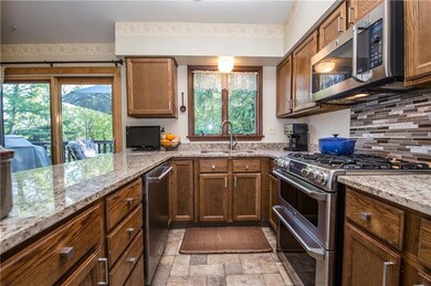 Eat-in kitchen with all new appliances, lots of ca
