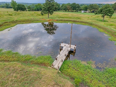 Dock with view of scattered trees