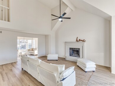 Large vaulted living room with fireplace