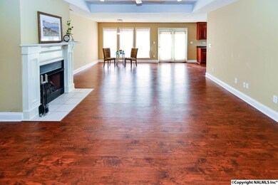 Enjoy the look of hardwoods with the easy-care of vinyl! Water-friendly, durable vinyl plank flooring installed in living room, dining room and kitchen to enhance the beauty and utility of these areas.