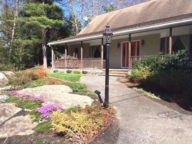 Exterior Front. The paved walkway...