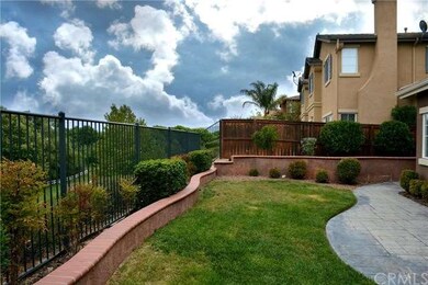 Spacious backyard with landscaping and panoramic v