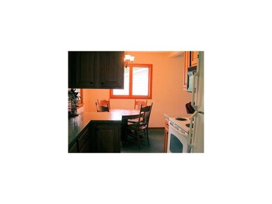 Kitchen. Kitchen and dining area with breakfast ba