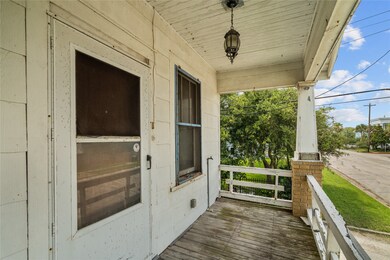 The porch is spacious enough for a couple of chair