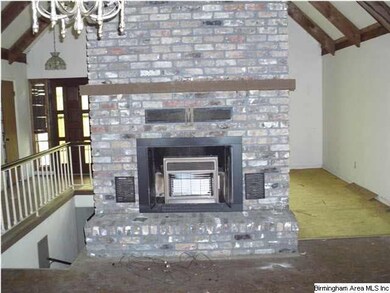 FIREPLACE IN MIDDLE OF A-FRAME GREAT ROOM/LIVING R