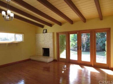 Open Beam Ceiling and Anderson Wood French Doors