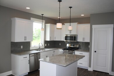 Kitchen 2 with center isle and snack bar