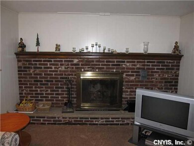 Family Room. Beautiful wall to wall wood burning f