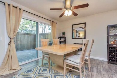 Formal dining room opens up to the private back pa