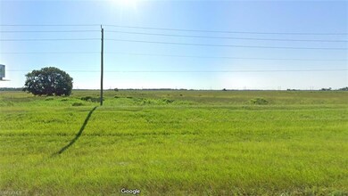 View of yard with a rural view