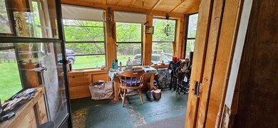 Glassed in porch of camp