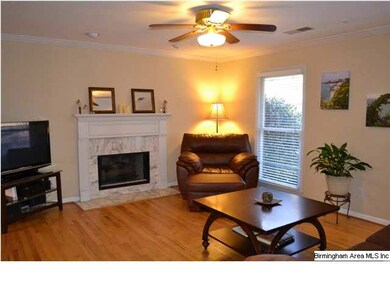 FIreplace with marble surround and detailed wood m