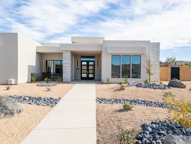 Entrance to property with stucco siding and french doors